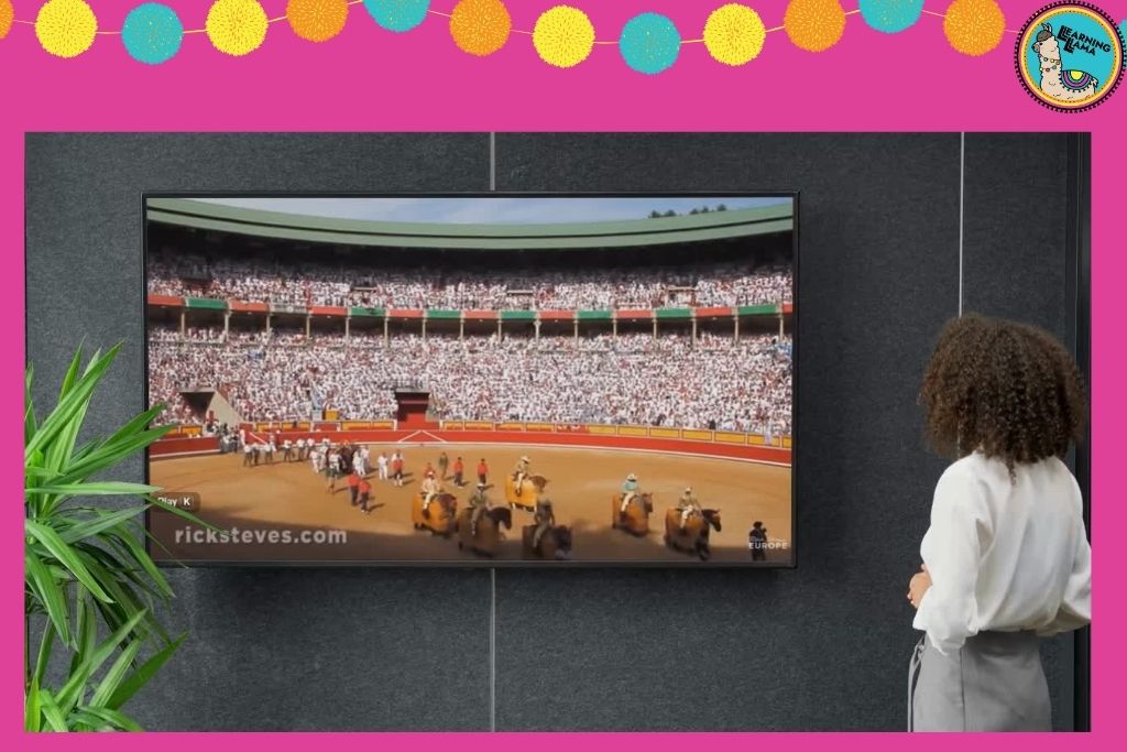 watching a video on running of the bulls and bullfighting in spain